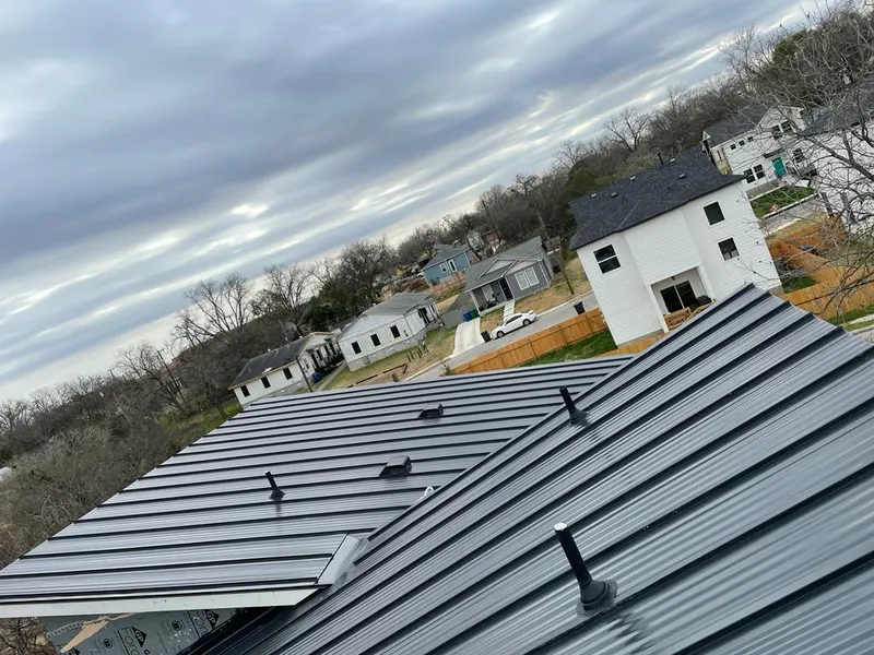 Standing seam metal roof panels with vents for Skylight Repair in Calhoun